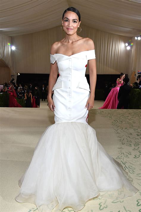 Alexandria Ocasio Cortez Makes Political Statement With Tax The Rich Gown At 2021 Met Gala