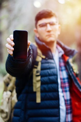 Close Up Shot Of Man Hand Holding Smartphone Stock Photo Download