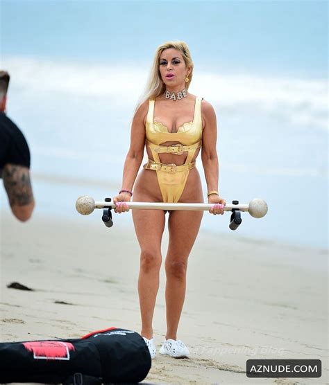 Marcela Iglesias Sexy Seen In A Golden Bikini During Beach Workout AZNude