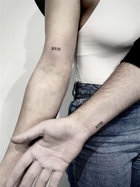 Matching Roman Numeral Tattoos in 2023 | Small hand tattoos, Inner ...