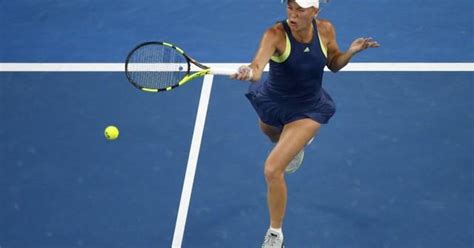 Emotional Wozniacki Wins First Major At Australian Open