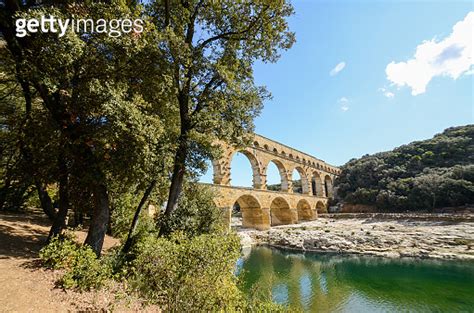 Pont Du Gard Ancient Roman Aqueduct Bridge And Gardon River Provence