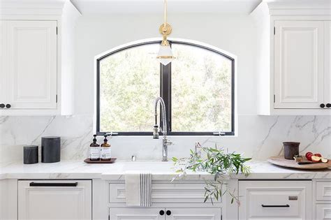 Gale Wall Sconce Over White Kitchen Sink Transitional Kitchen