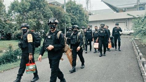 BERITA FOTO Pasukan Brimob Polda Sulut Kembali Dari Tugas BKO Di Papua