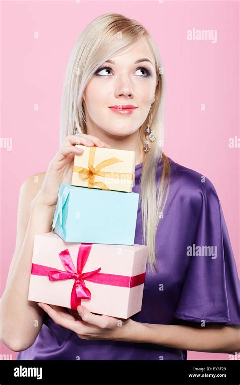 Blonde Woman With Present Stock Photo Alamy