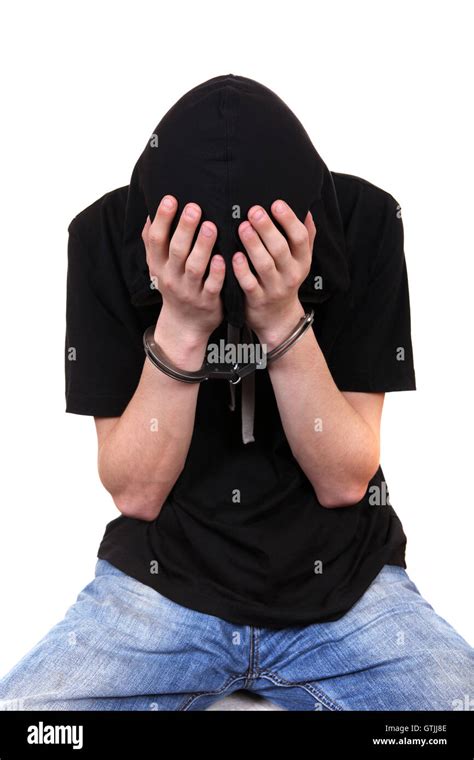 Arrested Young Man In Handcuffs Stock Photo Royalty Free Image