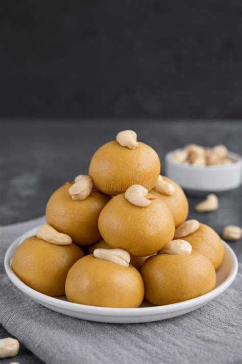 Indian Sweets Besan Laddu Or Laddoo On A Plate On A Concrete Bacground