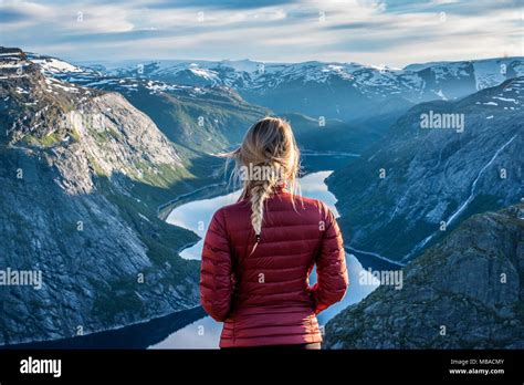 Spectacular sunrise at the top of Trolltunga in Norway (Norge Stock Photo - Alamy