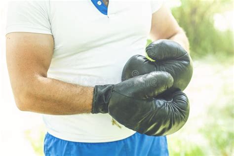 Man Athlete On Concentrated Face With Sport Gloves Practicing Boxing ...