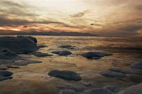 It is a Winter Sunset between Ice Mountain Stock Image - Image of ...