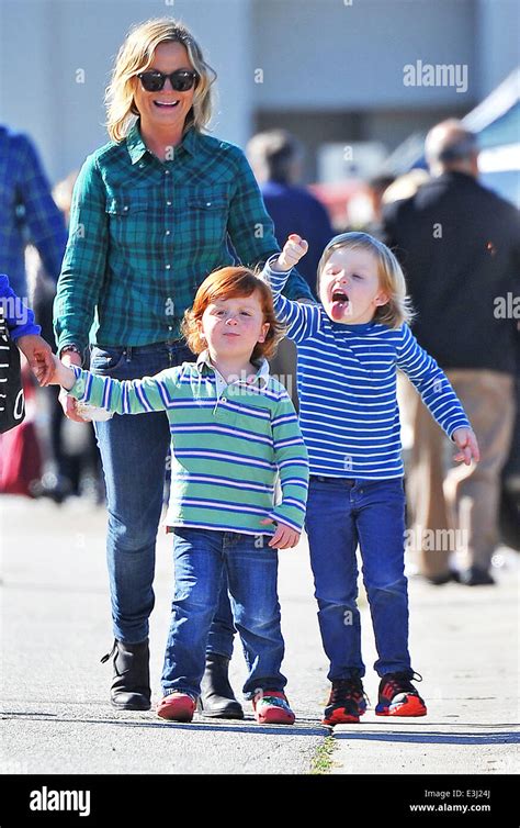 Amy Poehler takes her children Archie and Abel Arnett to a local Farmer ...