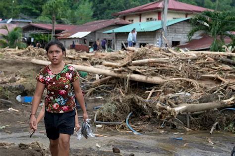 At Least Dead And Missing In Massive Flooding And Landslides In