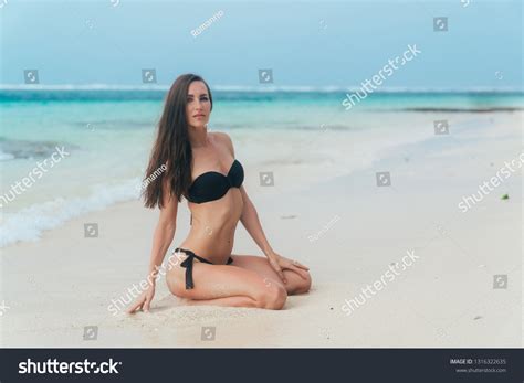 Sexy Brunette Girl Swimsuit Sunbathes On Stock Photo Shutterstock