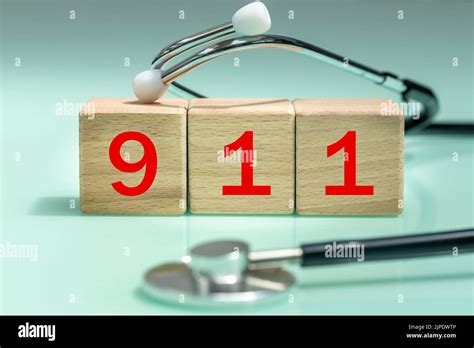 Emergency Number 911 Red Numbers On Wooden Blocks Medical Stethoscope