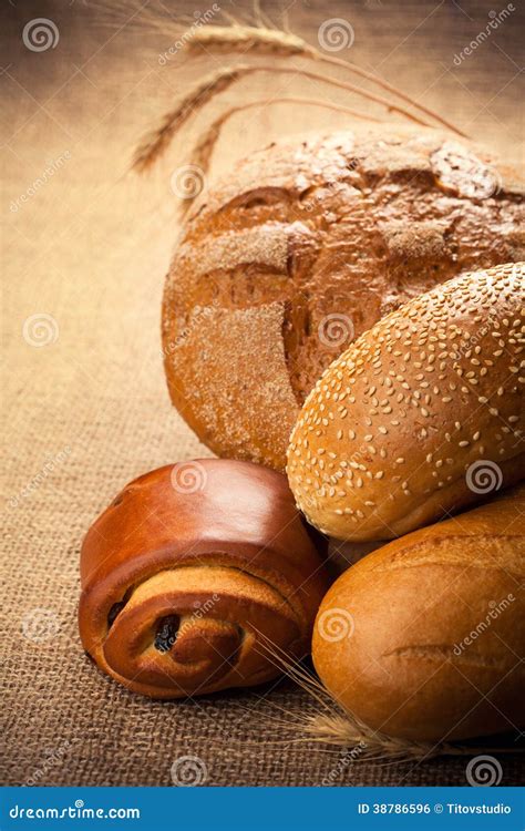 Assortment Of Fresh Baked Bread On The Burlap Stock Photo Image Of