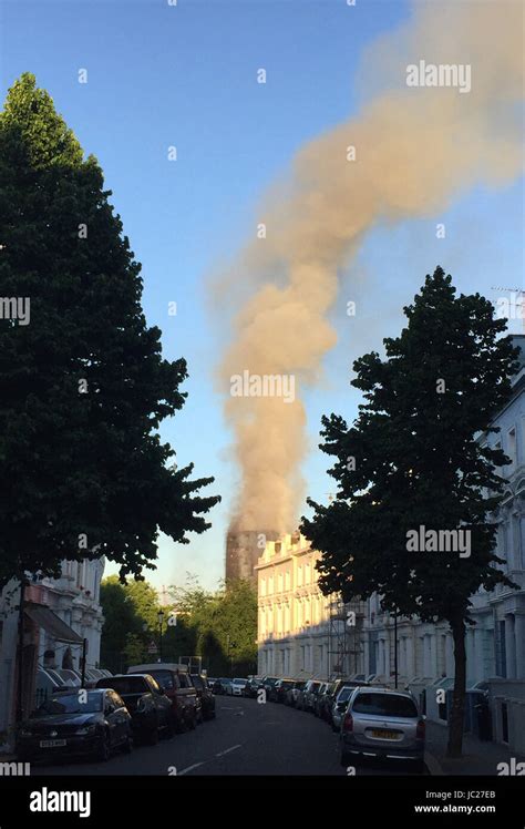 London Britain 14th June 2017 Smoke Rises From A Tower Block As