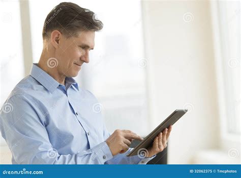 Businessman Smiling While Using Tablet Stock Image Image Of Looking