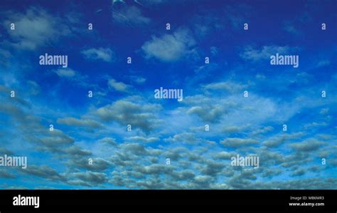 Cloudy Blue Skies Stock Photo Alamy