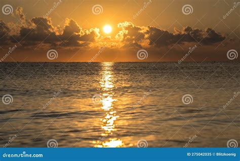 Sunset on the Beach with Clouds Stock Image - Image of beautiful ...