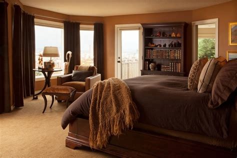 Bedroom With Warm Brown Walls And Dark Brown Bed Cover Traditional Bedroom Cozy Master