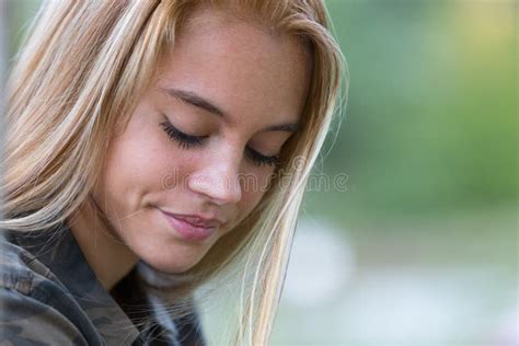 Coy Blonde Girl In A Park With Downcast Gaze Stock Image Image Of Blond Caucasian