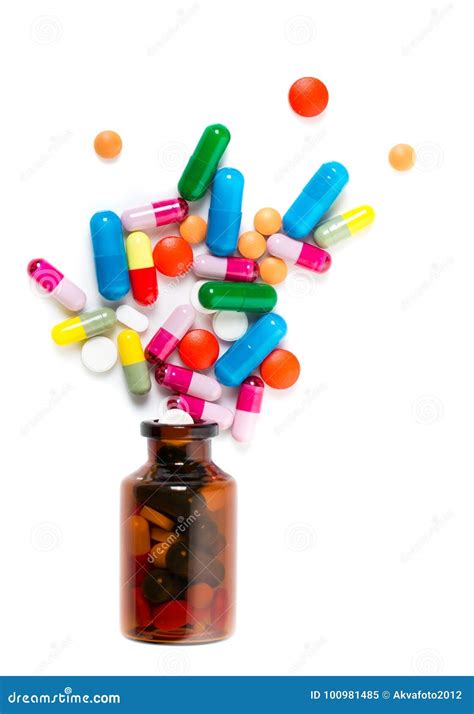 Colorful Pills Spilling Out Of A Toppled Bright Red Orange Pill Bottle Stock Image Image Of