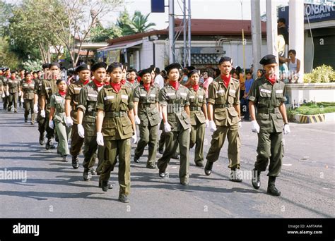 Philippines Young Filipinos Dressed In Military Uniform Marching In ...