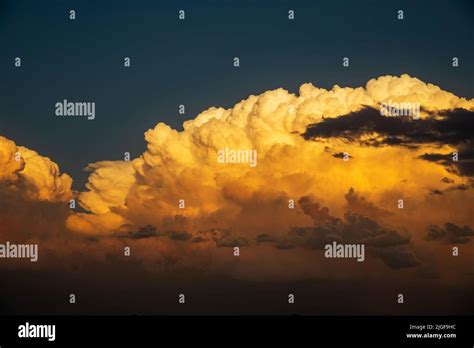 Thunderhead Clouds Form During The Summer Evening Stock Photo Alamy