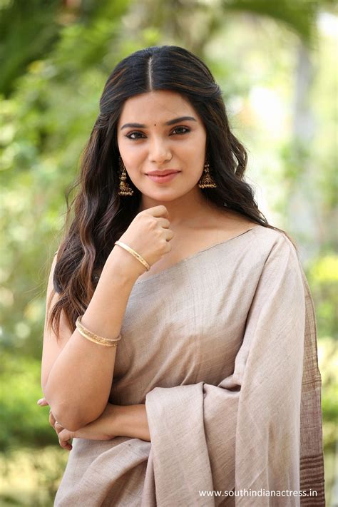 Aathmika Saree Stills At Vijaya