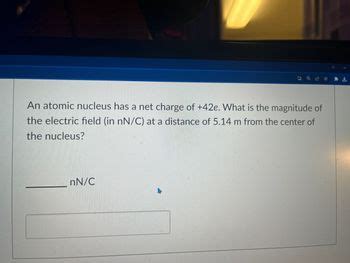 Answered: An atomic nucleus has a net charge of… | bartleby