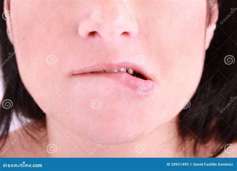 An Embarrassed Woman Biting On Her Lip Royalty Free Stock Photo Image