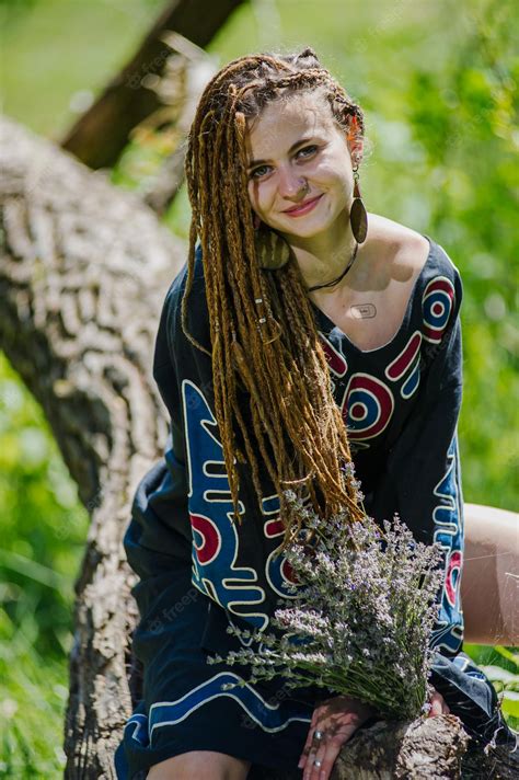 Premium Photo Beautiful Girl With Dreadlocks Dressed Hippie Styleposes Outdoors