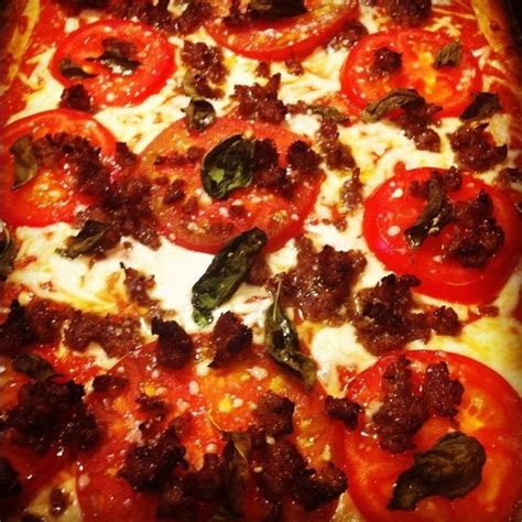 Homemade Pizza With Heirloom Tomatoes Garlic Basil Sausage Parmesan