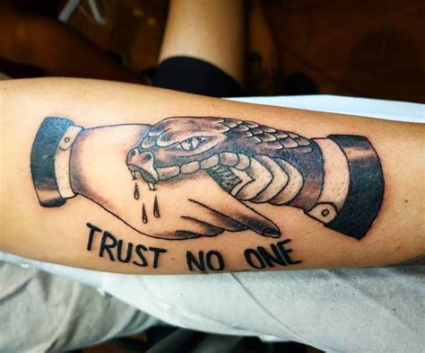 Top Trust No One Hand Tattoo In Cdgdbentre