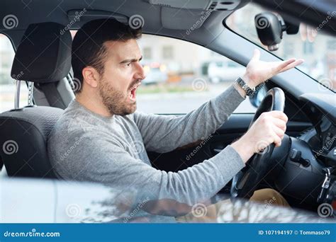 Angry And Rude Driver Portrait Sitting In His Car Stock Image Image