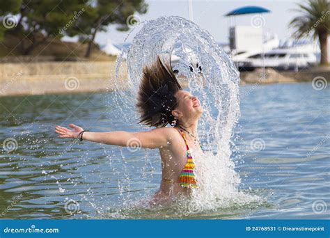 Girl Splashing Out Of The Water Stock Image Image Of Play Beach