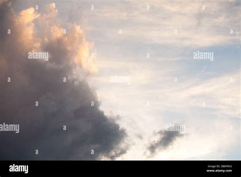 Storm clouds with blue sky background Stock Photo - Alamy