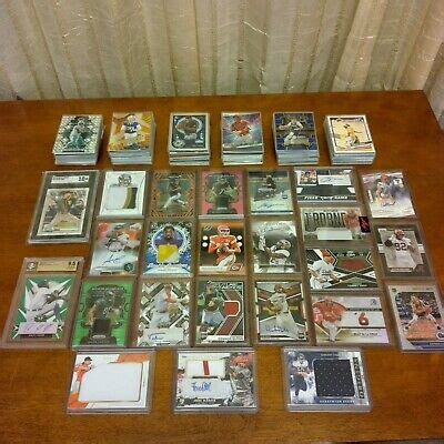 HUGE LOT OF OVER 200 SPORTS CARDS 1 1 RPA S AUTOS NUMBERED GRADED SP