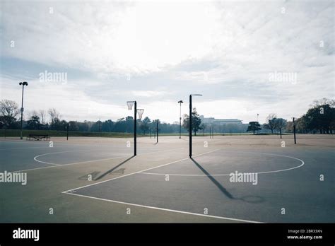 Netball Goal Ring And Net Against A Blue Sky And Clouds At Hagley Park