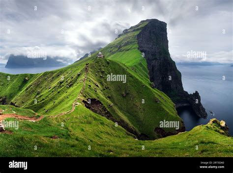 Kallur Lighthouse On Green Hills Of Kalsoy Island Faroe Islands