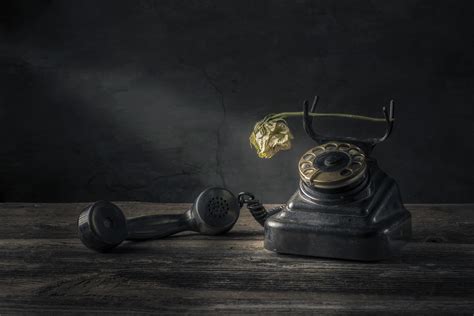 Vintage Black Phone On Old Wooden Table Background 2418102 Stock Photo