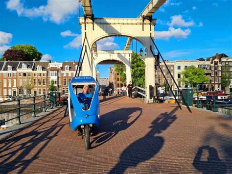 Amsterdam Visite guidée historique privée en cyclo pousse GetYourGuide