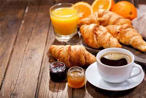 Breakfast With Cup Of Coffee And Croissants Stock Photo Adobe Stock