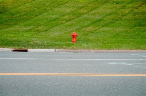 A Vibrant Red Fire Hydrant Stock Photo Image Of Suburban