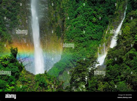 Humboldt Falls rainbow waterfall new zealand Hollyford Valley Fiordland ...