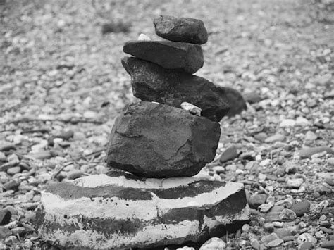 Premium Photo Close Up Of Stack Of Pebbles