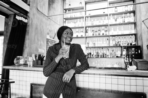 African American Businesswoman Drinking Cocktail Lemonade In Cafe At The Bar Black Girl Having