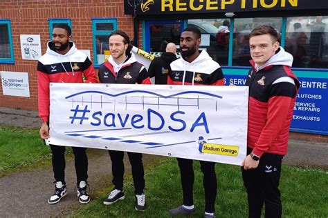 Doncaster Rovers players drop in at garage to back campaign to re-open airport