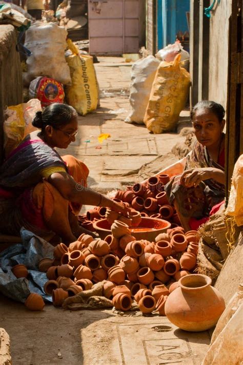 Two Women Pottery Workers Of The Dharavi Slums In Mumbai India