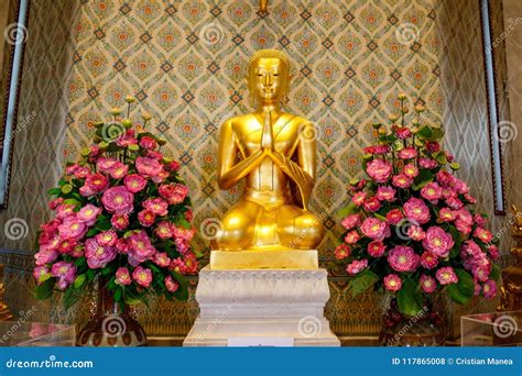 Golden Buddha Statue With Flowers In Thailand Buddha Temple Stock